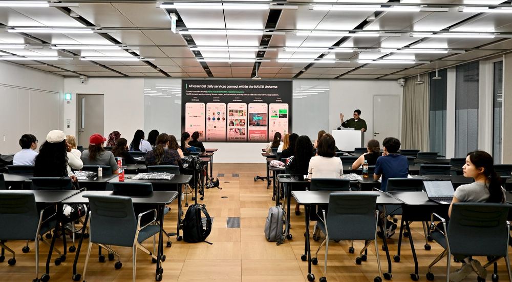 Students in a seminar room during a company session
